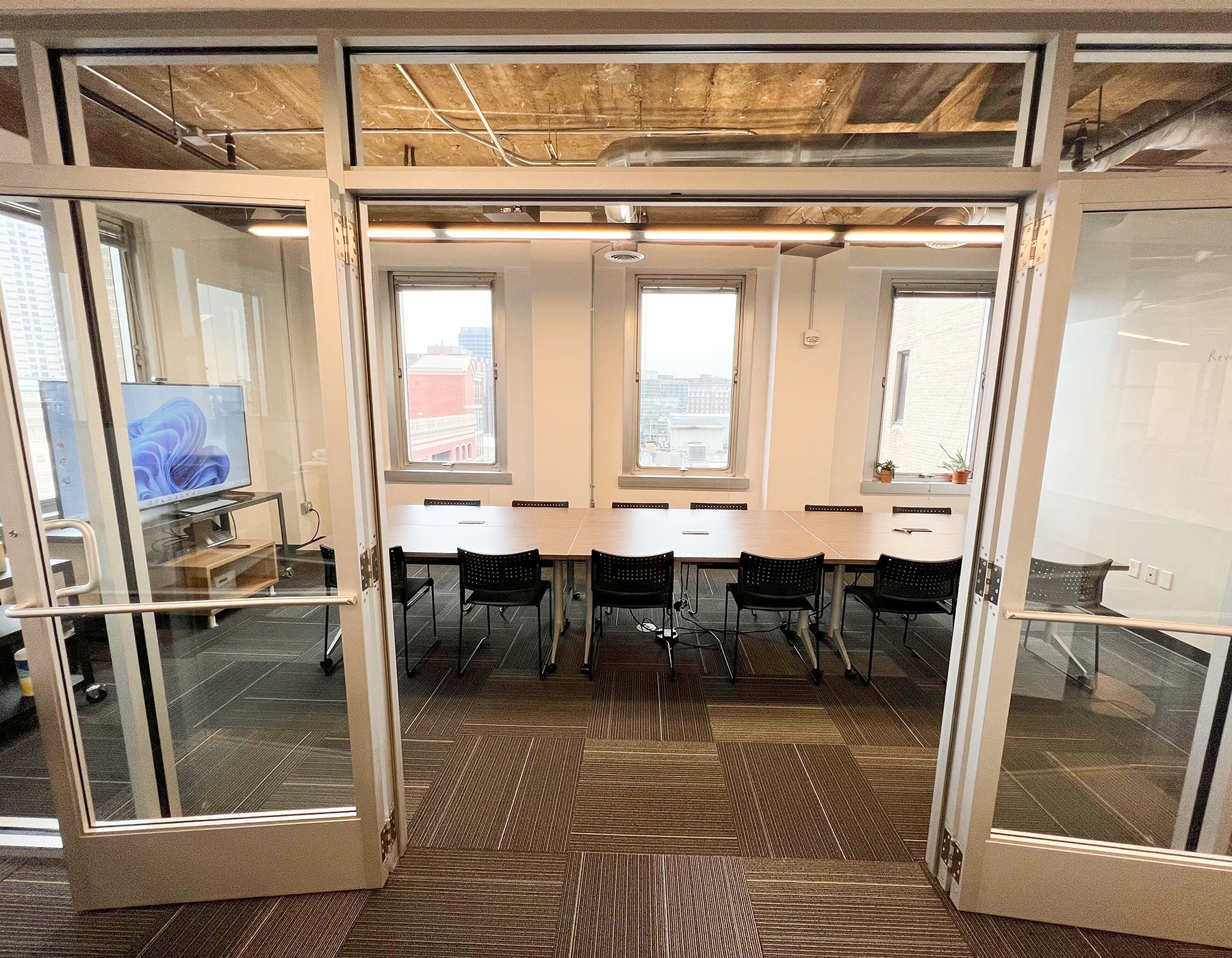 Glass double doorway in to the Learning Center conference room