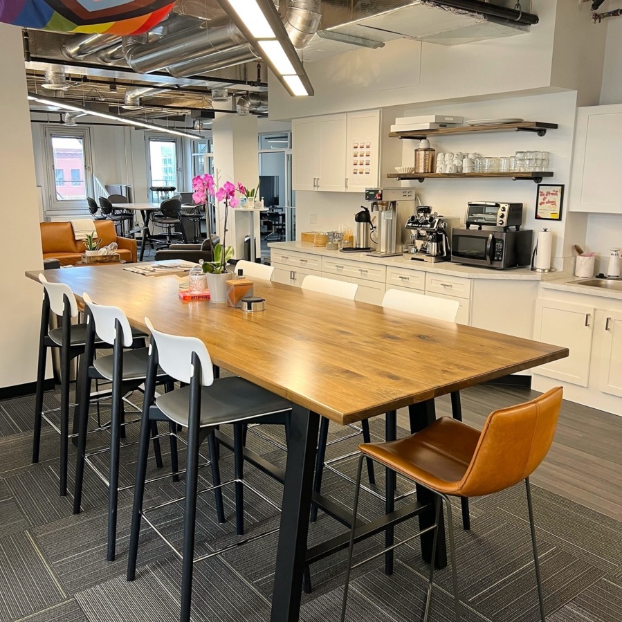 The large kitchen table for games, conversations, and eating